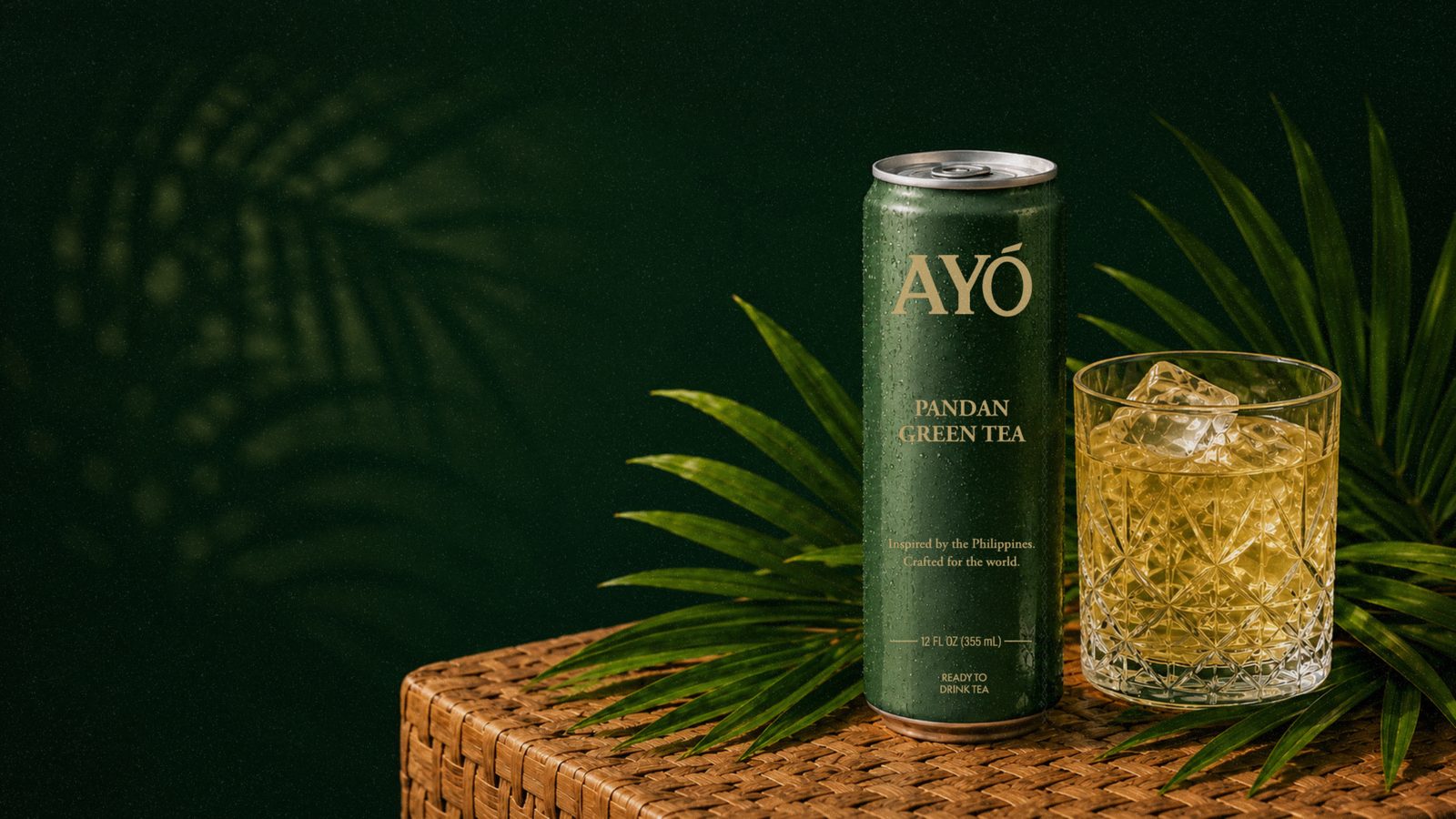 AYÓ Pandan Green Tea can with palm leaves