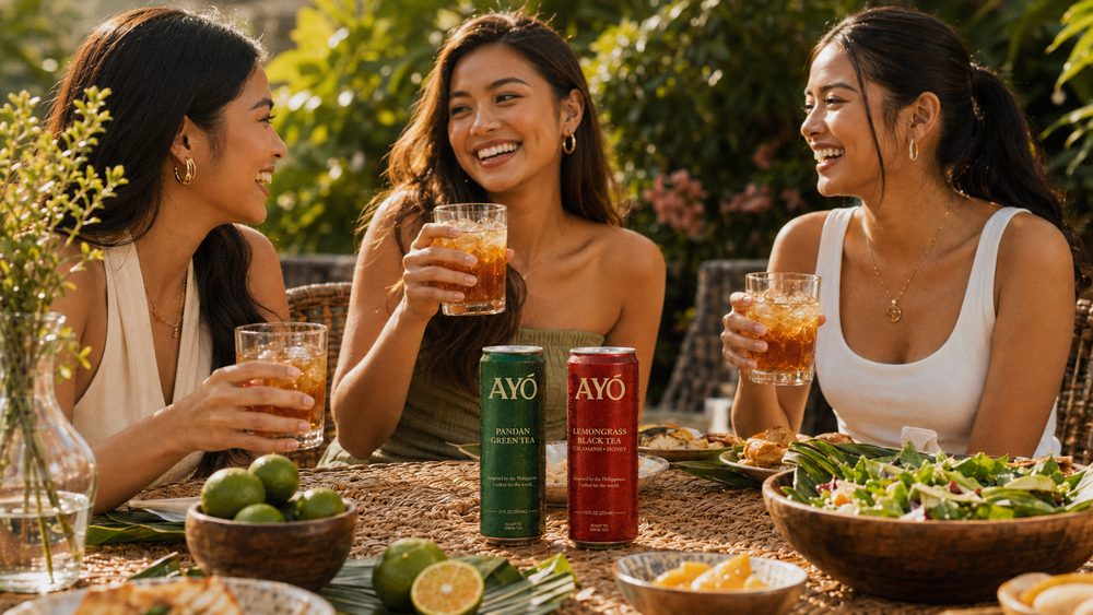A group enjoying AYÓ tea together in the garden
